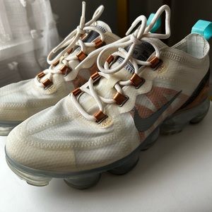 Nike air max vapor sneakers.